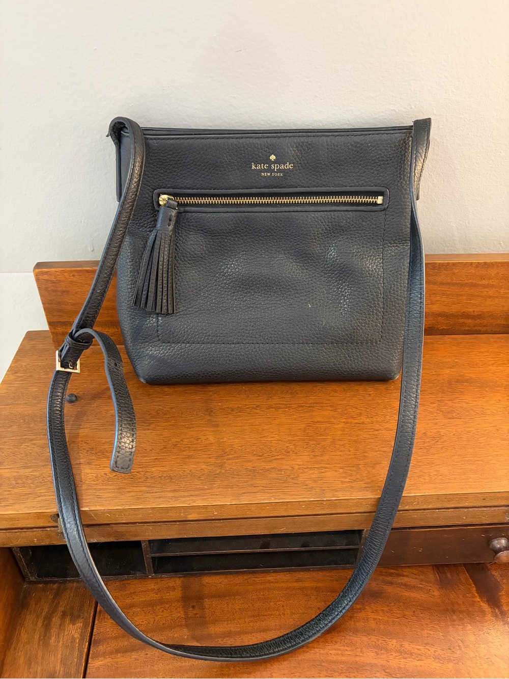 kate spade Black Pebbled Leather Crossbody with Tassel Zip